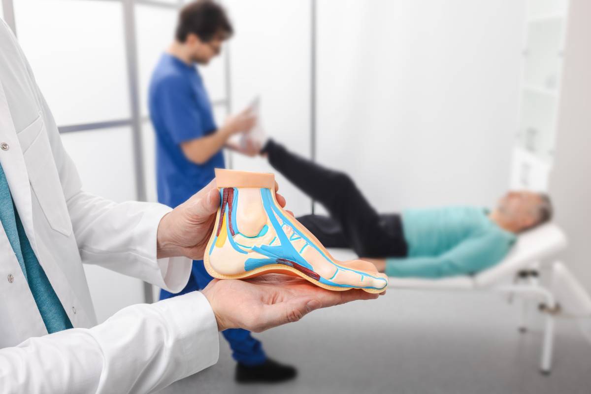 Foot diseases and treatment. Male patient with problem of feet while orthopedic doctor consultation at medical clinic